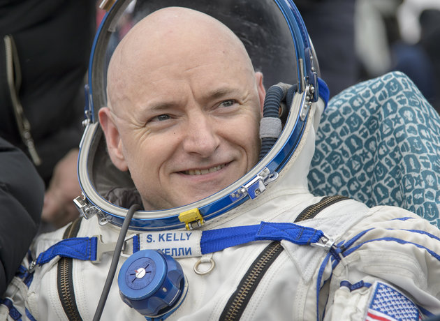 Astronaut Scott Kelly returned from nearly a year in space Tuesday with a certain youthful glow. (Photo by Bill Ingalls/NASA via Getty Images)